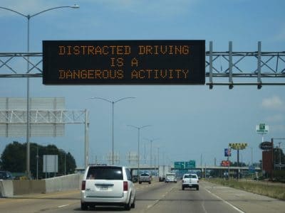 Distracting sign over the highway