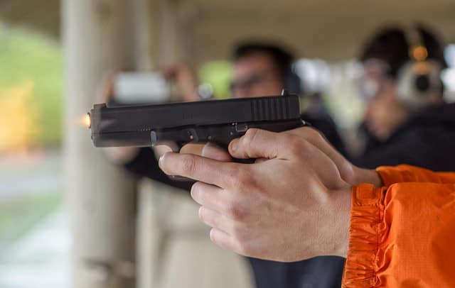 Shooting a handgun at a range