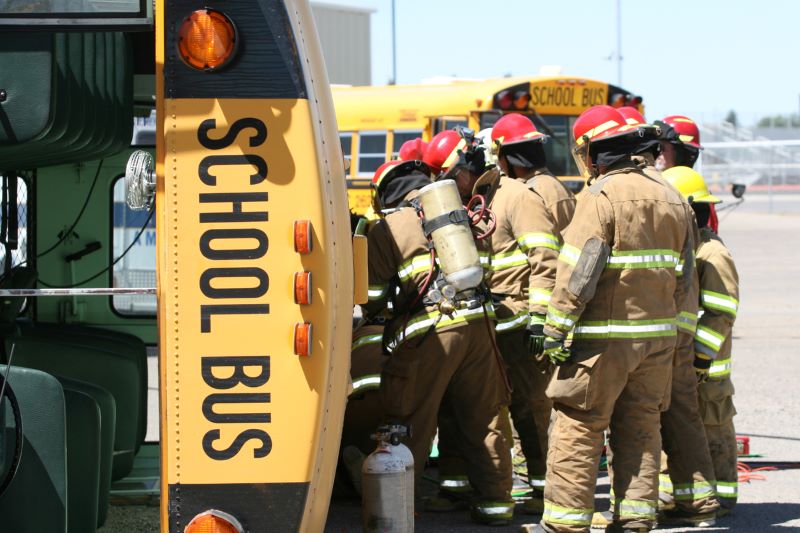 school bus accident with firefighters on the scene