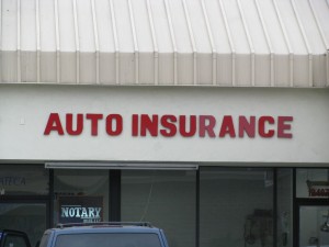 auto insurance sign on storefront