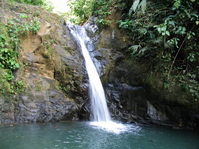 Swimming hole with waterfall